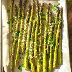 To make Lemon Garlic Roasted Asparagus, you need these simple and fresh ingredients: - 1 pound fresh asparagus, trimmed - 3 tablespoons olive oil - 4 garlic cloves, minced - Zest of 1 lemon - 2 tablespoons fresh lemon juice - Salt and pepper to taste - 1 tablespoon grated Parmesan cheese (optional) - Fresh parsley, chopped for garnish These ingredients work together to create a bright and tasty dish. The asparagus gives crunch, while the garlic adds savory depth. The lemon zest and juice bring a refreshing zing. You can also add Parmesan for richness, but it is not necessary. When choosing asparagus, look for firm stalks with bright green tips. This ensures you have fresh and tasty asparagus. If you can't find fresh asparagus, you can use frozen. Just adjust the cooking time a bit. For a fun twist, think about adding your favorite herbs or spices. This dish is versatile and easy to customize. The Full Recipe will guide you through the cooking process step by step. Enjoy cooking! - Preheat the oven to 425°F (220°C). - Rinse the asparagus under cool water. - Trim the tough ends of the asparagus. - In a large bowl, mix olive oil, minced garlic, lemon zest, and lemon juice. - Add the asparagus to the bowl. - Toss until the asparagus is evenly coated. - Spread the coated asparagus on a baking sheet. - Make sure they are in a single layer. - Season with salt and pepper to taste. - Roast the asparagus for 15-20 minutes. - Shake the pan halfway through for even cooking. - If you like cheese, sprinkle grated Parmesan over the asparagus. - Do this during the last 3 minutes of roasting. - Once done, remove from the oven. - Garnish with fresh parsley before serving. For the complete process, check the Full Recipe. Even coating is key for great flavor. When you mix the asparagus with oil and spices, make sure every piece gets some love. This helps each bite taste amazing. To avoid soggy asparagus, don’t crowd the pan. Spread the pieces out in a single layer. If they touch, they will steam instead of roast, making them soft. You can add spices or herbs to change the taste. Try red pepper flakes for heat or thyme for a fragrant touch. If you want a cheesy twist, go for alternatives like feta or goat cheese. They add a lot of flavor without overpowering the lemon. Serving suggestions are important for impressing guests. Place the asparagus on a nice platter and drizzle with extra lemon juice. You can also sprinkle more cheese on top before serving for a gourmet touch. Pair this dish with proteins like grilled chicken or fish. It also goes well with grains like quinoa or rice for a complete meal. For the full recipe, check out the details above. {{image_2}} You can change how you cook lemon garlic asparagus for new flavors. - Grilled Lemon Garlic Asparagus Grilling adds a smoky flavor. Brush the asparagus with olive oil and season with salt and pepper. Place them on a hot grill for about 5-7 minutes. Flip them halfway for even cooking. The grill marks and char will enhance the taste. - Sautéed Lemon Garlic Asparagus Sautéing is quick and keeps the asparagus crisp. Heat olive oil in a pan over medium heat. Add minced garlic first for flavor. Then, toss in the asparagus. Stir for 5-7 minutes until bright green and tender. This method retains a nice crunch. You can easily swap ingredients based on what you have or prefer. - Olive oil alternatives If you don't have olive oil, try avocado oil or melted butter. Both add rich flavor and work well with lemon and garlic. - Fresh herb variations Want to mix things up? Use fresh thyme, rosemary, or basil instead of parsley. Each herb brings its unique taste, making the dish interesting. Making the dish fit your diet is simple. - Vegan modifications Leave out the Parmesan cheese for a vegan dish. You can add nutritional yeast for a cheesy flavor without dairy. - Gluten-free options This recipe is naturally gluten-free. Enjoy it without any modifications. It’s a great side dish for anyone avoiding gluten. For the full recipe, check out the detailed instructions. To store leftovers, let the asparagus cool first. Place it in an airtight container. This keeps it fresh for up to 3 days. Use glass or plastic containers with tight lids for best results. The best methods for reheating asparagus are in the oven or on the stovetop. Preheat your oven to 350°F (175°C). Place the asparagus on a baking sheet and heat for about 10 minutes. You can also use a skillet on medium heat. Just add a tiny bit of oil and heat for 3-5 minutes. Avoid overcooked asparagus by watching it closely. You want it warm but still crisp. Yes, you can freeze Lemon Garlic Roasted Asparagus. To freeze it, first, let it cool completely. Spread the asparagus out on a baking sheet and freeze until solid. Then, transfer it to a freezer bag. Remove as much air as possible to prevent freezer burn. When ready to eat, thaw it in the fridge overnight and reheat as mentioned above. This keeps the flavor intact while saving time for future meals. The best way to prepare asparagus is to trim it first. Cut off the tough ends. Then, wash the asparagus under cold water. Pat it dry with a clean towel. Next, toss the asparagus with olive oil, minced garlic, lemon zest, and lemon juice. This mix adds flavor and helps it roast well. Follow the steps in the [Full Recipe] for perfect results. Yes, you can make Lemon Garlic Roasted Asparagus ahead of time. Prepare the asparagus and toss it with the olive oil and seasonings. Store it in your fridge for up to 24 hours. When ready to eat, roast it as directed. This way, you save time on busy days. Roasted asparagus lasts about 3 to 5 days in the refrigerator. Store it in an airtight container to keep it fresh. When you want to eat it again, simply reheat it. Enjoy it warm, or add it cold to salads. Frozen asparagus can work, but fresh is best. If you use frozen, thaw it first. Pat it dry to remove excess moisture. Roasting frozen asparagus may take a bit longer. Keep an eye on it while it cooks. If you don’t have fresh garlic, you can use garlic powder. Use about 1/4 teaspoon for each clove. Mix it in with the olive oil and other ingredients. The flavor won’t be the same, but it will still taste good. Yes, you can add other vegetables. Try bell peppers, cherry tomatoes, or baby potatoes. Just chop them to similar sizes. Toss them in the same mix of olive oil and seasonings. Be sure to adjust the cooking time as needed. Lemon Garlic Roasted Asparagus is simple to make and full of flavor. The steps are easy: prep your ingredients, roast the asparagus, and add tasty touches. With tips on cooking and storage, you can enjoy this dish any time. Try different cooking methods or ingredients to keep things fresh. This dish pairs well with many meals, making it versatile. Follow these steps and enjoy a healthy side that impresses. Your kitchen will become the go-to for delicious asparagus.
