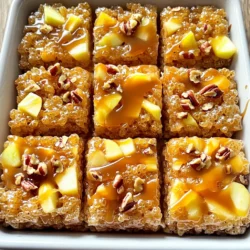 - 4 cups Rice Krispies cereal - 1 cup mini marshmallows - 1/2 cup unsalted butter - 1 cup caramel sauce The main ingredients make this snack special. Rice Krispies give the treats their crunch. Mini marshmallows add a soft, chewy texture. Butter helps everything stick together and adds flavor. Caramel sauce is the star of the show, giving these treats their sweet and gooey goodness. - 1 large apple, diced (preferably Granny Smith for tartness) - 1/2 teaspoon cinnamon - 1/2 teaspoon vanilla extract These extra flavorings make your treats pop! Diced apples add a fresh crunch. I recommend Granny Smith apples for their tartness. Cinnamon gives a warm, cozy taste. Vanilla extract adds depth and richness, making every bite more enjoyable. - 1/4 cup chopped pecans - A pinch of salt You can add these optional ingredients for more texture and flavor. Chopped pecans add a nice crunch. A pinch of salt balances the sweetness of the caramel. These tiny tweaks can take your treats to the next level! To start, you need to grease your baking dish. Use a 9x13 inch dish for the best results. You can use butter or non-stick spray to coat the bottom and sides. This step helps the treats come out easily later. Make sure you cover every corner for a smooth release. Next, it’s time to melt the butter and marshmallows. Use a large saucepan and set the heat to medium-low. This heat is key. It prevents burning and gives you a smooth mix. Add 1/2 cup of unsalted butter first. Once it melts, add 1 cup of mini marshmallows. Stir continuously until it is all melted and smooth. After melting, take the pan off the heat. Now, it’s time to add flavor. Stir in 1/2 teaspoon of vanilla extract and a pinch of salt. Don’t forget to add 1/2 teaspoon of cinnamon. These flavors bring warmth and depth to your treats. Mix well until everything blends together. Now, let’s add the Rice Krispies. Measure out 4 cups of Rice Krispies cereal. Gradually pour them into the melted mixture. Use a spatula to gently fold the cereal in. This technique helps ensure every piece gets coated evenly without crushing them. Next, fold in the diced apples. Use 1 large Granny Smith apple for a nice tartness. Also, pour in 3/4 cup of caramel sauce. Gently mix to combine the apples and caramel without breaking them apart. If you want, you can add 1/4 cup of chopped pecans for a crunchy texture. Finally, transfer your mixture into the greased dish. Press down firmly to level it out. It should be even throughout the dish. Drizzle the remaining 1/4 cup of caramel sauce on top. Use a spatula to lightly swirl it into the surface. This creates a nice, gooey topping. Now, let it cool for about 30 minutes at room temperature. You can chill it in the fridge for 15 minutes if you want to speed things up. To achieve gooeyness without stickiness, use fresh marshmallows. Stale marshmallows can make your treats hard. When melting, keep your heat low. Stir gently to blend the butter and marshmallows smoothly. After mixing in the Rice Krispies, don't overwork the mixture. This helps keep the treats soft and chewy. Using tart apples like Granny Smith adds a nice contrast to the sweet caramel. Their crisp texture holds up well in the treats. Plus, they balance the sweetness and enhance the overall flavor. You can also try other tart varieties, but Granny Smith is my top choice. To boost flavor, consider adding a pinch of nutmeg or allspice along with cinnamon. You can also mix in some chopped dried fruit for extra sweetness. Try adding a splash of lemon juice to the apples. This keeps them fresh and adds a zesty kick. Experiment with different spices to find your favorite twist! {{image_2}} You can change the topping to make it fun. Try using: - Chocolate chips - Crushed graham crackers - Sprinkles - Shredded coconut These toppings add a new taste and texture. You can mix and match them too. This way, everyone can find their favorite! Switching flavors can make your treat special. You can use different types of caramel. Here are some ideas: - Sea salt caramel for a sweet and salty mix - Apple pie caramel for extra spice - Butterscotch caramel for a richer flavor You might also try different nuts. Almonds or walnuts can add crunch. Just remember to chop them small! You can make these treats fit your diet. To make them gluten-free, use gluten-free Rice Krispies. For nut-free treats, skip the nuts or use sunflower seeds. These swaps let you enjoy the fun without worry. Everyone can dig in and enjoy! To keep your Caramel Apple Rice Krispie Treats fresh, store them in an airtight container. This will prevent them from getting hard or stale. Place parchment paper between layers if stacking, to avoid sticking. Keep the treats at room temperature for the best taste and texture. Avoid putting them in the fridge, as this can make them too firm. Yes, you can freeze Caramel Apple Rice Krispie Treats! Wrap them tightly in plastic wrap and then place them in a freezer-safe bag. Make sure to remove as much air as possible to avoid freezer burn. When you want to eat them, let them thaw at room temperature for a few hours before enjoying. These treats can last for about a week at room temperature when stored properly. If frozen, they can last up to three months. Always check for any signs of spoilage before eating, such as changes in smell or texture. Enjoy your treats while they’re fresh for the best flavor! Yes, you can use homemade caramel sauce. Homemade caramel can offer a richer flavor. However, it requires more time and skill to make. Store-bought caramel is quick and easy. It saves you time and gives you a smooth texture. If you want to try homemade, go for it! Just make sure it cools before mixing. Granny Smith apples are the best choice. They add a nice tartness to the treat. Tart apples contrast well with sweet caramel. Other good options include Honeycrisp and Fuji apples, but they are sweeter. You can mix different apples for a fun twist! To keep your treats from sticking, grease your pan well. Use butter or non-stick spray. Another tip is to wet your hands when pressing the mixture. This helps prevent sticking while you shape the treats. You can also store them in layers with parchment paper in between. Yes, you can make these treats ahead of time. They stay fresh for about three days at room temperature. You can also store them in the fridge for a firmer texture. Just cover them well to keep them soft. This blog post detailed how to make delicious Caramel Apple Rice Krispie Treats. We covered the main ingredients, from Rice Krispies to caramel sauce, and added flavorful options like apples and cinnamon. I shared step-by-step instructions for perfecting the recipe, along with tips for great texture and storage practices. Remember, you can adjust flavors and toppings to suit your taste. Enjoy making these treats! They'll be a hit at any gathering or as a sweet snack for yourself. Happy cooking!