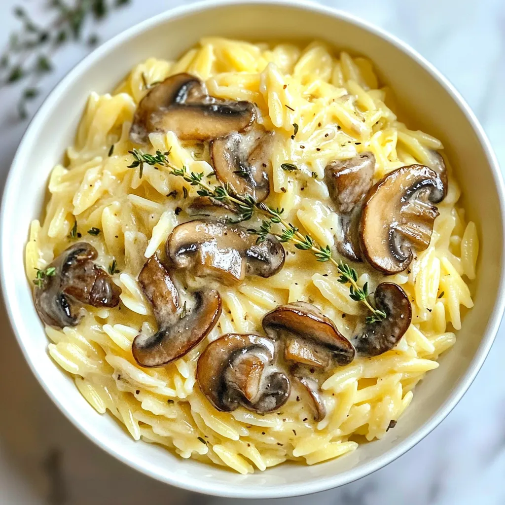 To make creamy mushroom orzo, you will need the following ingredients: - 1 cup orzo pasta - 2 tablespoons olive oil - 1 medium onion, finely chopped - 3 cloves garlic, minced - 8 ounces of mixed mushrooms (cremini, shiitake, and button), sliced - 1 cup vegetable broth - 1 cup heavy cream - 1/2 cup grated parmesan cheese - Salt and pepper to taste - Fresh thyme leaves for garnish You can swap some ingredients for others. If you don’t have orzo, use rice or quinoa. For the olive oil, feel free to use butter for a richer flavor. If you want a lighter dish, replace heavy cream with half-and-half or cashew cream. You can also use any cheese instead of parmesan, like feta or mozzarella. If you like mushrooms, try adding different types, such as portobello or oyster mushrooms. For the best taste, always use fresh ingredients when you can. Fresh mushrooms will give you a rich flavor and nice texture. Fresh thyme adds a great aroma, too. Dried mushrooms can work in a pinch, but they may need soaking first. Fresh garlic and onion provide a stronger taste than dried versions. When using dried ingredients, adjust the amounts as they are more concentrated. {{ingredient_image_1}} Start by heating 2 tablespoons of olive oil in a large pot over medium heat. Once the oil is hot, add 1 medium onion, finely chopped. Cook the onion for about 5 minutes until it is soft and translucent. Next, stir in 3 cloves of minced garlic. Cook it for 1 more minute. You want the garlic to release its lovely aroma. Now, add 8 ounces of mixed mushrooms to the pot. Use cremini, shiitake, and button mushrooms for great flavor. Sauté the mushrooms for 7 to 8 minutes. They should become tender and release their moisture. Stir occasionally to ensure even cooking. Once the mushrooms are ready, add 1 cup of orzo pasta. Stir it well to combine. Toast the orzo for 1 to 2 minutes. This adds a nice depth of flavor. Then, pour in 1 cup of vegetable broth and bring the mixture to a simmer. Lower the heat to low, cover the pot, and cook for 10 to 12 minutes. Stir the orzo every few minutes until it's tender. After cooking, remove the lid and stir in 1 cup of heavy cream and 1/2 cup of grated parmesan cheese. Mix until creamy and smooth. Season with salt and pepper to taste. If it seems too thick, add a little more broth or water. Cook for another 2 to 3 minutes until everything is hot. Serve it warm, garnished with fresh thyme leaves for added flavor. Enjoy! To cook orzo just right, use plenty of water. Orzo needs room to move. Add a pinch of salt to the water. This helps the pasta taste better. Stir the orzo often while it cooks. This stops it from sticking together. Cook it for about 8 to 10 minutes. Taste it before draining. You want it al dente, firm yet tender. To boost flavor, use fresh herbs like thyme. They add brightness to the dish. A squeeze of lemon juice can bring out the mushrooms' taste. You can also use garlic powder for extra depth. If you like heat, sprinkle in some red pepper flakes. Always taste as you go. Adjust salt and pepper to make it perfect. One common mistake is overcooking the orzo. It can turn mushy if you cook it too long. Another mistake is not using enough salt in the water. This can make the pasta bland. Be careful when adding cream to the orzo. If it cooks too long after adding cream, it can curdle. Stir gently and serve right away for the best texture. Pro Tips Use Fresh Mushrooms: Fresh mushrooms will provide a better texture and flavor compared to canned ones. Experiment with different varieties for unique tastes. Toast the Orzo: Lightly toasting the orzo before adding the broth enhances its nutty flavor, making your dish even more delicious. Adjust Creaminess: If you prefer a lighter dish, feel free to substitute half of the heavy cream with additional vegetable broth for a creamier yet lighter sauce. Garnish Wisely: Fresh herbs like thyme or parsley not only add color but also elevate the dish's flavor profile, so don’t skip the garnish! {{image_2}} You can make this dish vegan by swapping out a few ingredients. Use plant-based cream instead of heavy cream. This keeps the dish rich and creamy without dairy. You can also replace parmesan cheese with nutritional yeast. It adds a cheesy flavor without animal products. Use vegetable broth to keep it vegan-friendly. This version tastes just as great and is perfect for everyone. If you want to add protein, chicken and shrimp work well. To add chicken, use cooked, diced chicken breast. Stir it in just before serving. For shrimp, sauté them in a separate pan until they turn pink. Then mix them into the orzo. Both options make the meal heartier. They add flavor and nutrition, perfect for a filling dinner. You can also add seasonal vegetables for more color and taste. Try spinach, kale, or asparagus in spring. In summer, zucchini and bell peppers are great choices. In fall, add butternut squash or pumpkin. For winter, use Brussels sprouts or root vegetables. Chop them smaller so they cook quickly. This way, you enjoy fresh flavors while staying healthy. Each veggie adds its own unique touch to the dish. After enjoying your creamy mushroom orzo, store any leftovers in an airtight container. Let the dish cool to room temperature before sealing it. This way, you keep the flavors fresh. Store it in the fridge for up to three days. If you want to save some for later, you can freeze creamy mushroom orzo. Place the cooled dish in a freezer-safe container. Make sure to leave some space at the top, as the orzo will expand when frozen. It can last for up to three months in the freezer. When you're ready to eat, just thaw it in the fridge overnight. Reheating creamy mushroom orzo is easy. If it's from the fridge, warm it in a pot over low heat. Stir in a splash of vegetable broth or water to help it get creamy again. If you are reheating from the freezer, let it thaw first, then use the same method. You can also use a microwave, but heat it in short bursts and stir often for even warming. You can use half-and-half or milk for a lighter dish. For a dairy-free option, try coconut cream or cashew cream. Both add creaminess without dairy. If you want a tangy flavor, use sour cream or Greek yogurt. Just mix it in at the end for a nice touch. Yes, you can make it ahead. Cook the orzo and sauce, then store them separately. This keeps the orzo from getting mushy. Store them in airtight containers in the fridge for up to three days. When ready to eat, simply reheat in a pot with a splash of broth. If your orzo is too thick, add more liquid. Use vegetable broth or water to loosen it up. Stir as you add until it reaches your desired consistency. This keeps the dish creamy and smooth while enhancing flavor. In this article, I covered making a delicious creamy mushroom orzo. You learned about ingredients, cooking steps, and tips to avoid mistakes. Exploring variations, I shared ways to customize your dish with vegan options or added protein. I also included storage advice to keep your leftovers fresh and tasty. With these insights, you can create a tasty meal tailored to your needs. Enjoy your cooking journey with orzo!