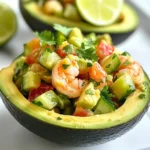 - 1 pound large shrimp, peeled and deveined - 2 ripe avocados, diced - 1 medium cucumber, diced - 1 red bell pepper, diced - 1 jalapeño, finely chopped - 1/4 cup red onion, finely chopped For the main ingredients, you want to choose fresh shrimp and ripe avocados. The shrimp should be large and pink. This gives a nice bite to the dish. The avocados should be soft but not mushy. They add creaminess that balances the spice. - 2 tablespoons lime juice - 1 tablespoon olive oil - 1 teaspoon chili powder - Salt and pepper to taste The dressing is key to this salad. Lime juice brings bright flavor. Olive oil helps mix everything. Chili powder adds heat and depth. Adjust salt and pepper to your taste. This simple dressing ties all the flavors together. - 2 tablespoons fresh cilantro, chopped - Additional lime juice for serving Fresh cilantro adds a burst of freshness. You can use more lime juice when serving for extra zing. These garnishes make the salad look and taste fresh. They enhance the overall flavor, making it even more enjoyable. {{ingredient_image_1}} First, grab a bowl. Mix together the chili powder, olive oil, lime juice, salt, and pepper. This mix will be your tasty marinade. The flavors will really blend together here. Next, add the shrimp to the bowl. Toss the shrimp well to coat it in the marinade. Let it sit for 15-20 minutes. This step is key. It allows the shrimp to soak up all those bold flavors. While the shrimp marinates, prepare your vegetables. Dice the avocados, cucumber, and red bell pepper. Make sure to chop the jalapeño and red onion finely. Place all these diced veggies into a large mixing bowl. Their colors will brighten your salad. Now, heat a skillet over medium-high heat. Add the marinated shrimp to the skillet. Cook the shrimp for 2-3 minutes on each side. You’ll know they are done when they turn pink and are cooked through. Once the shrimp is cooked, let it cool for a minute. Then, add the shrimp to the bowl with the veggies. Toss everything gently with the chopped cilantro. Be careful not to mash the avocados while mixing. Finally, taste your salad. Adjust the seasoning with salt and pepper if needed. Serve it right away for the best flavor. Enjoy the freshness and spice of this delightful dish! To know when shrimp is cooked, look for a few signs. Cooked shrimp turn pink and form a C shape. If they curl tightly, they might be overcooked. Keep an eye on the time. Cook shrimp for just 2-3 minutes on each side. You can also grill or boil shrimp as great alternatives. For grilling, preheat your grill and cook shrimp on skewers. Boiling is simple too: just add shrimp to boiling water for 2-3 minutes. To keep avocados from browning, try a few tricks. Squeeze fresh lime juice on cut avocado. This keeps it green longer. Another method is to store it with the pit in, covered tightly. When choosing avocados, you want ripe ones. Press gently; they should yield slightly. Avoid hard avocados, as they are not ready to eat. Want extra spice? Add more jalapeño or a dash of hot sauce. You can also sprinkle in red pepper flakes for a kick. For dressings, consider a creamy avocado dressing. A citrus vinaigrette adds fresh flavor too. Both options will take the salad to the next level. Pro Tips Marinate for Flavor: Allow the shrimp to marinate for at least 15-20 minutes to absorb the spices and enhance the overall flavor of the salad. Choose Ripe Avocados: Make sure your avocados are perfectly ripe for the best taste and texture. They should yield slightly to gentle pressure when squeezed. Adjust Spice Level: If you prefer a milder salad, you can reduce the amount of jalapeño or remove the seeds before chopping. Garnish Creatively: Enhance the presentation by using fresh cilantro leaves or lime wedges as a garnish for added color and freshness. {{image_2}} You can easily change the seafood in this salad. Try using scallops or crab for a twist. Both options add new flavors and textures. If you want a vegetarian choice, use chickpeas instead of shrimp. They provide protein and make the dish filling. Adding fruits can brighten the salad's taste. Mango or pineapple adds sweetness and a tropical vibe. These fruits pair well with the spicy shrimp. You can also switch up the herbs. Try parsley or basil for a fresh flavor change. Each herb gives a unique taste to the dish. The dressing can be a game changer. You might want to try a creamy avocado dressing. It adds rich flavor and smoothness. Another option is a citrus vinaigrette. This tangy dressing complements the salad well. Both alternatives are tasty and easy to make. To store your Spicy Shrimp Avocado Salad in the fridge, use an airtight container. This keeps the salad fresh and tasty. Place the salad in the fridge right after serving. It can last up to two days. Avoid adding avocados if you plan to store it. This helps prevent browning and mushiness. For freezing, I do not recommend freezing the salad as it may change the texture. However, if you want to freeze the shrimp, make sure they are cooked first. Cool the shrimp completely, then place them in a freezer bag. Squeeze out as much air as you can before sealing. When you are ready to eat, thaw the shrimp in the fridge overnight. The recommended duration for fresh salad is about two days. After this, the quality may drop. You will know the salad has spoiled if the shrimp smells off or the vegetables look slimy. Always check for any changes before serving leftovers. You can use leftover salad in many ways. Try mixing it with cooked pasta for a quick meal. You can also add it to a tortilla for a spicy wrap. Another fun idea is to turn it into a dip. Just mash the salad and serve it with chips. This way, you can enjoy the flavors in new dishes! Yes, you can use frozen shrimp. To thaw, place the shrimp in a bowl of cold water for about 15-20 minutes. Change the water halfway through. You can also leave the shrimp in the fridge overnight. This method is safe and keeps the shrimp fresh. To lower the spice level, reduce or skip the jalapeño. You can also use bell pepper for crunch without heat. Adding more diced avocado can help balance the spice too. If you want a creamy texture, blend some avocado into the dressing. Yes, this salad works well for meal prep. Keep the shrimp and veggies separate until ready to eat. Store the shrimp in an airtight container in the fridge. You can chop the veggies a day ahead. Add the avocado just before serving to keep it fresh. This salad pairs well with rice or quinoa for a fuller meal. You can also serve it with tortilla chips for a fun crunch. Fresh fruit like mango or pineapple makes a great side too. Consider a light soup to start your meal. This blog post covered the key ingredients for a spicy shrimp avocado salad, including shrimp, avocados, and seasonings. I shared easy steps to prepare and cook, along with tips for perfecting flavors and storing leftovers. You can add variety with ingredient swaps and different dressings. Remember, cooking is fun, and this salad is fresh and tasty. Now, it’s your turn to make this dish. Enjoy the bright flavors and share your creations!
